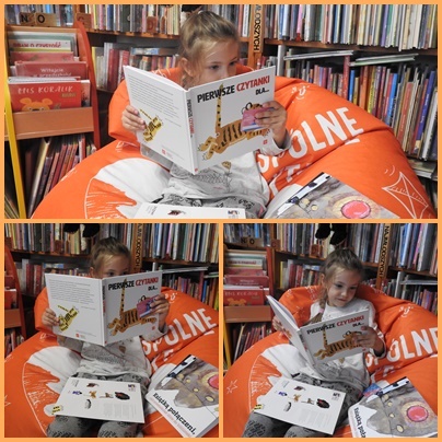 Dziewczynka siedzi na pomarańczowej pufie czyta w bibliotece ksiązkę, która otrzymała w ramach akcji ,,Mała książka, wielki człowiek". 